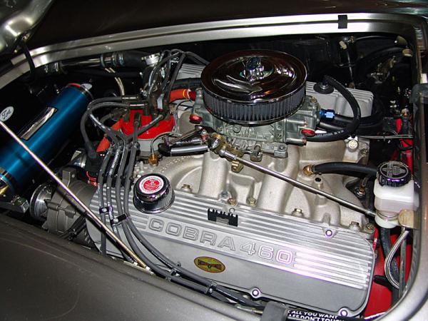 Ford Racing Products 460 cu. in., upgraded with roller tappet lifters and Accusump oil pressure guard and pre-oiler. Air filter changed to larger diameter. I'm looking for a scoop pan that would fit...