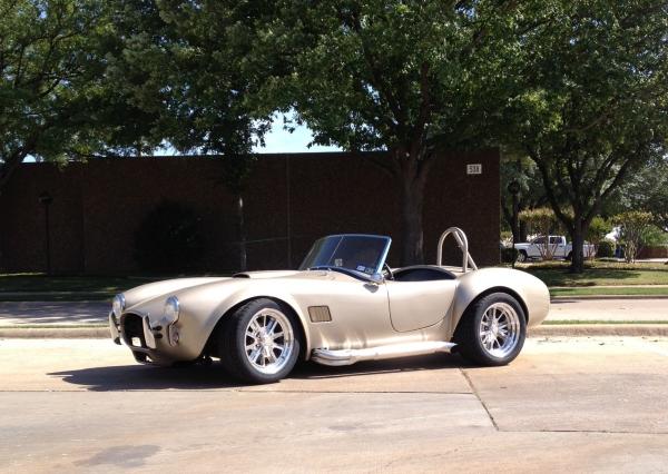New tires and wheels installed.  American Racing 427 with Nitto 555