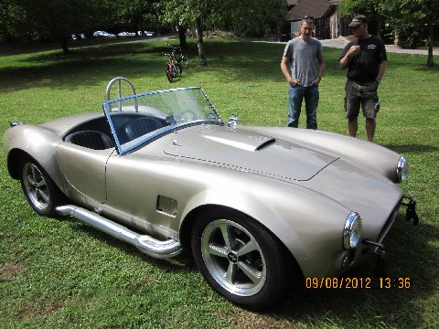 First car show.  :-D!!!! Standing with Coach.  Trying to soak up as much knowledge as possible.