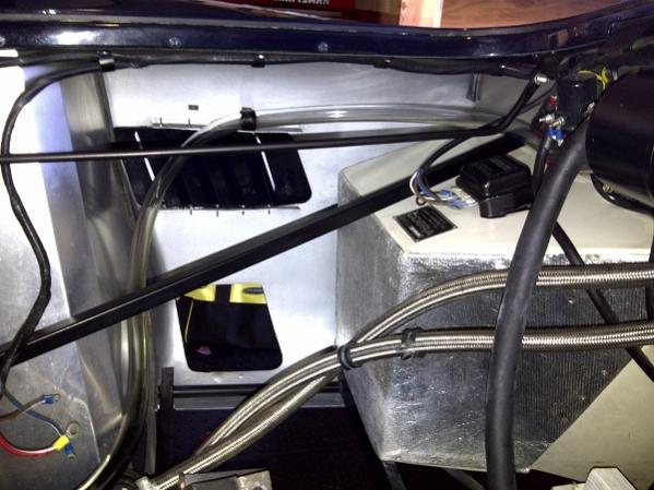 Engine room cleaned up and puke tank drain line plummed to oil pan.