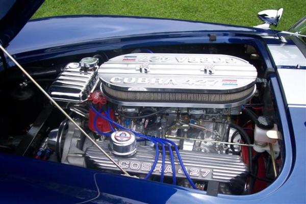Custom Air Cleaner that I Machined from Billet as well as wingnuts and oil breathers