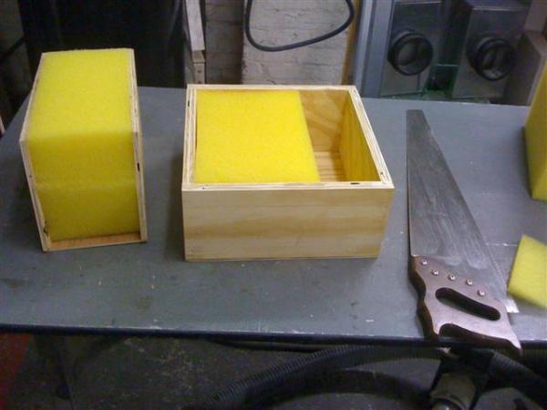 Jigs to cut the foam to shape.  I sharpened the top edge of the hand saw blade and it worked really well for cutting the foam.