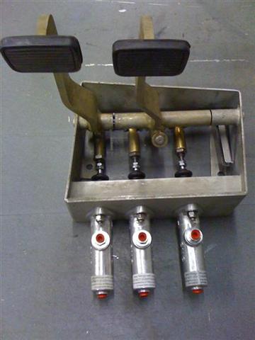 Installed the CNC Master cylinders.  3/4" for the clutch. 3/4" for the Wilwood front calipers and 7/8" for the rear Jaguar calipers.  I hopr this combination works well.