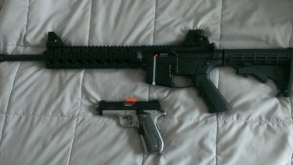 "Mommy went shopping again"...picked up a new Kimber .45ACP MasterCarry Pro and Smith&Wesson M&P-22 rifle. After all, a girl can NEVER have too many weapons!