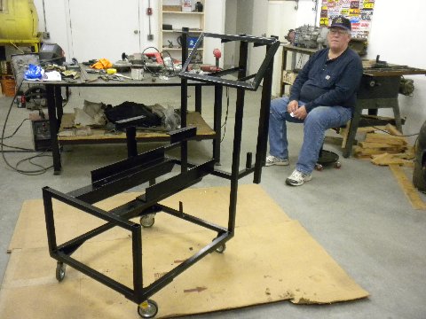 engine test stand and Lawrence watching the paint dry