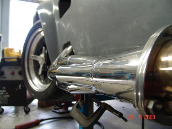 Cobra rebuild 12, 304 s/s merge style collectors,Home made with welder and angle grinder. :-)