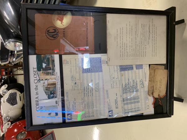 Some documents from the 289 including 500 mile service record.