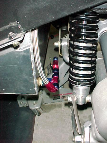 Fuel outlet from tank with shut-off valve for a drain.