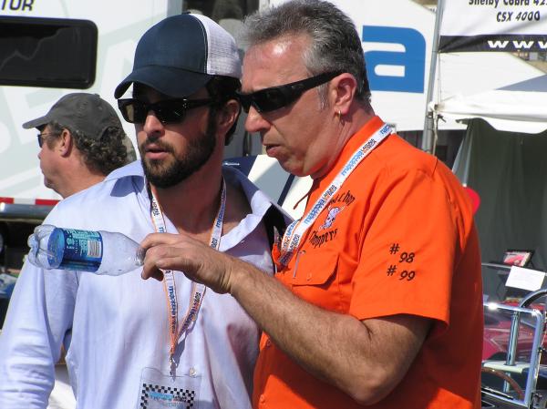 George and alex in deep discussion during a walk of the pit area @ Laguna seca