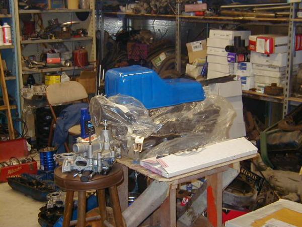 The chassis began as two lengths of 4" steel tubing on jack stands.  All parts were cut out by hand, assembled and hand welded to form the completed chassis.