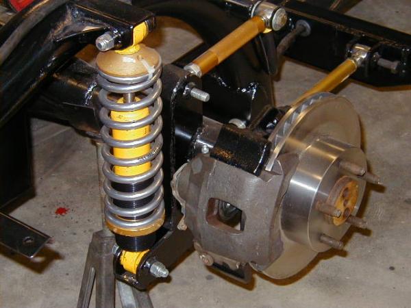 Closeup of rear suspension and brakes.