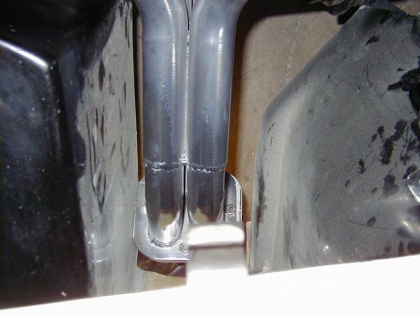 Modified sprint car header with flange to mate to side pipe, ceramic coated.