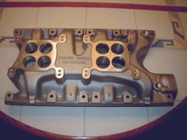 Brand new Price dual quad intake for the 351W motor will run dual Holley #8007 390 cfm carbs.