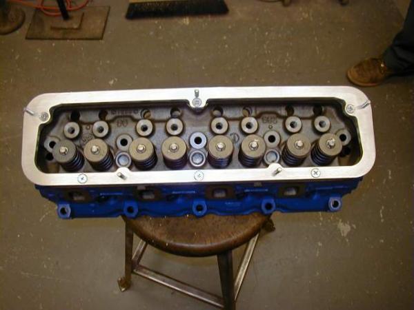 One of my FE valve cover adapter plates mounted to a 351W cylinder head for demonstration purposes.