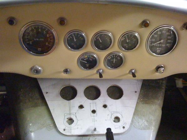 Mock up of the additional instrument panel that will be made from 3/16" thick aluminum. It fits nicely on the transmission tunnel.