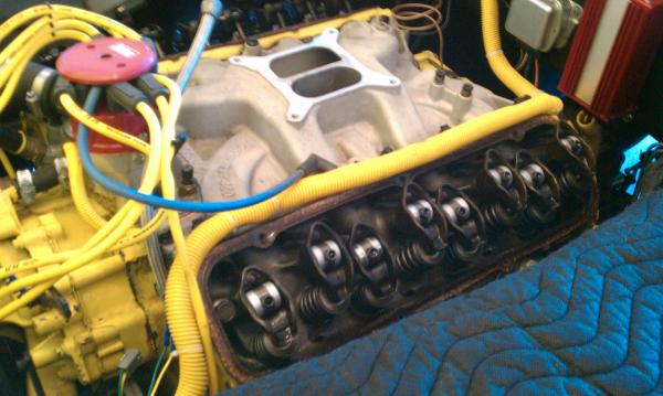 Getting started by removing the carb., and valve covers.