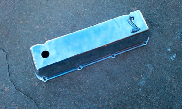 A new set of aluminum valve covers with Cobra emblems