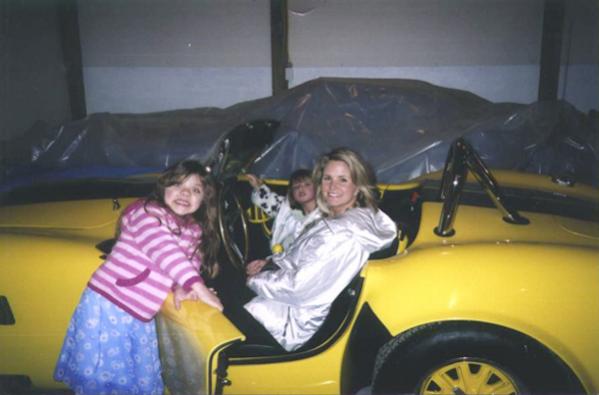 My wife and two daughters sitting in the car