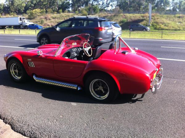 Flat tyre in the new cobra, looks like i need a tow truck.