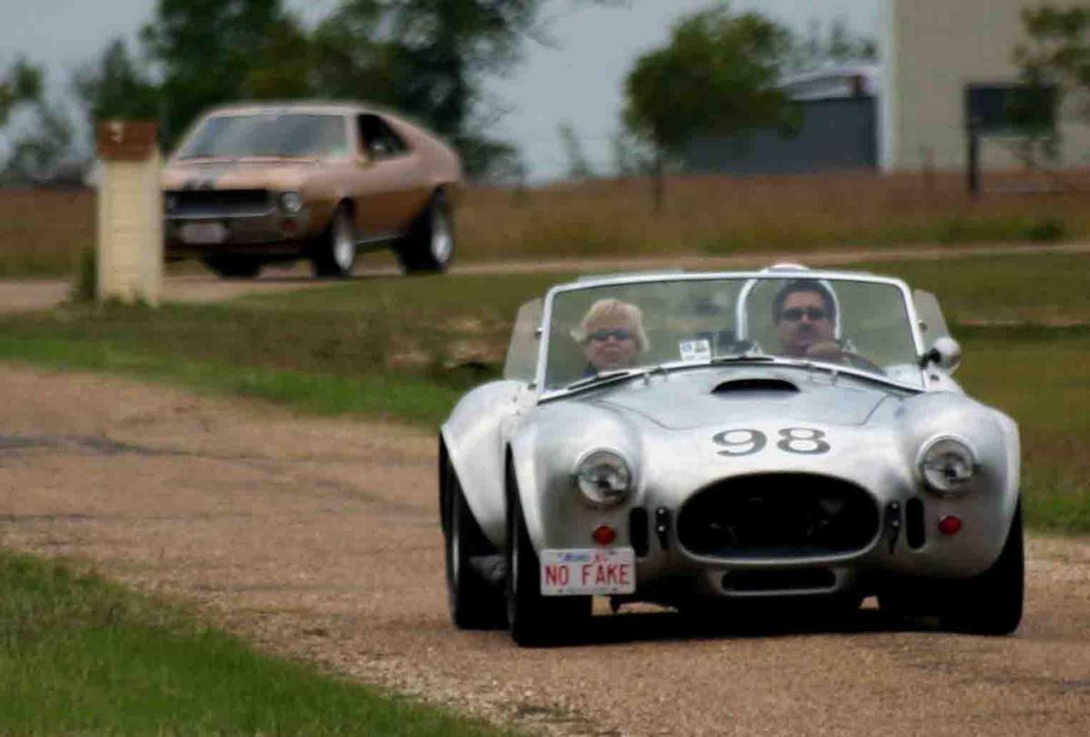 15281LeeandKayAMXinbackgroundloresandcropped