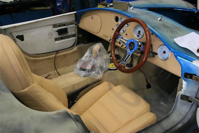 Drivers_seat_Steering_and_dash_in_Large_Small_