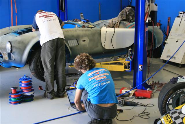 Jimmy_and_his_mate_wiring_up_my_Cobra_Small_